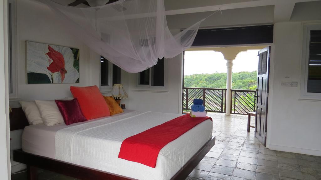 Calibishie Cove Hotel Buitenkant foto